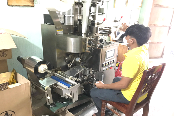 Bình Định nghiệm thu đề án “Hỗ trợ ứng dụng máy móc thiết bị vào sản xuất trà nụ hoa hòe túi lọc”  